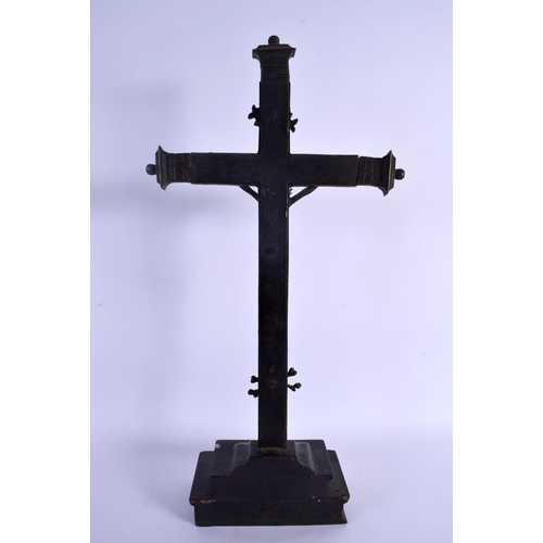 352 - A 19TH CENTURY EUROPEAN BRONZE AND WOOD CORPUS CHRISTI overlaid with skulls. 45 cm x 17 cm.