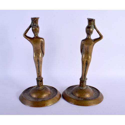 357 - A PAIR OF 17TH/18TH CENTURY EUROPEAN BRONZE CANDLESTICKS modelled as Adam & Eve. 27 cm high.