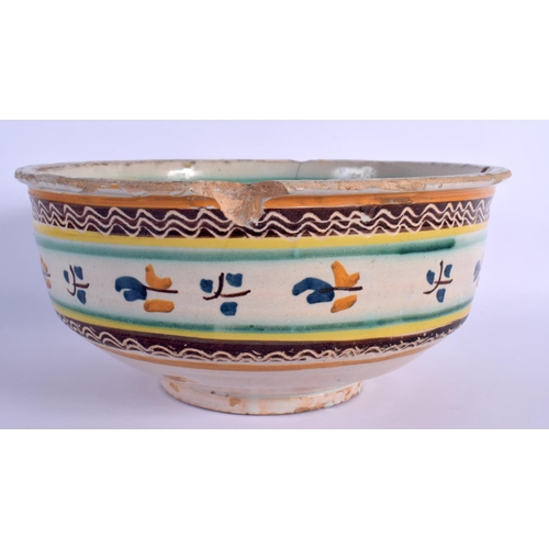 4 - A 17TH/18TH CENTURY SOUTH EUROPEAN FAIENCE GLAZED BOWL painted with sparse foliage. 24 cm x 12 cm.