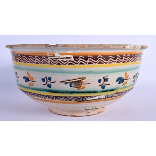 4 - A 17TH/18TH CENTURY SOUTH EUROPEAN FAIENCE GLAZED BOWL painted with sparse foliage. 24 cm x 12 cm.