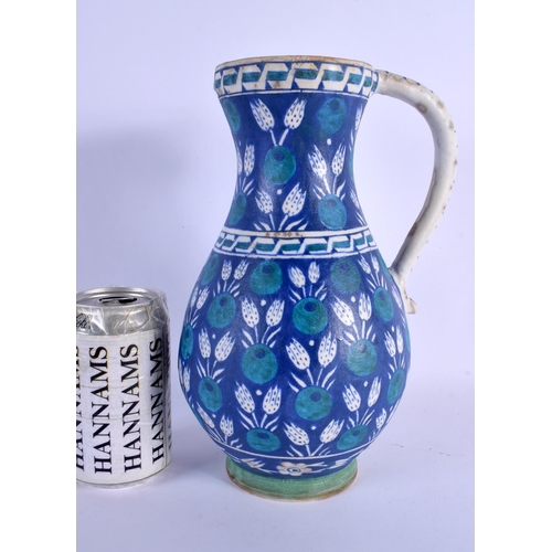 40 - A LARGE TURKISH OTTOMAN IZNIK FAIENCE TYPE WATER JUG painted with motifs. 26 cm x 12 cm.