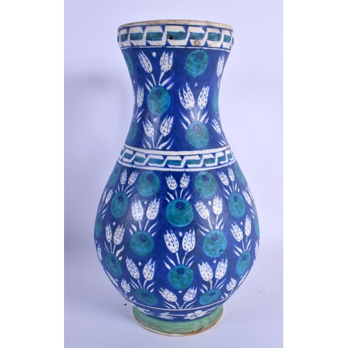 40 - A LARGE TURKISH OTTOMAN IZNIK FAIENCE TYPE WATER JUG painted with motifs. 26 cm x 12 cm.