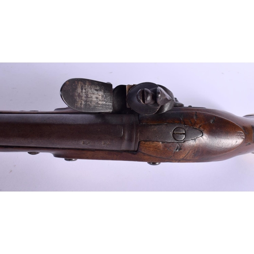 420 - AN ANTIQUE FLINT LOCK PISTOL by Spencer. 38 cm wide.