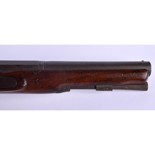 421 - AN ANTIQUE FLINT LOCK PISTOL by I Adams. 38 cm wide.