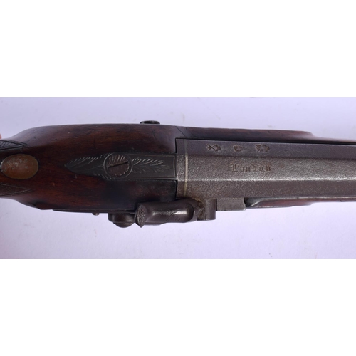 421 - AN ANTIQUE FLINT LOCK PISTOL by I Adams. 38 cm wide.
