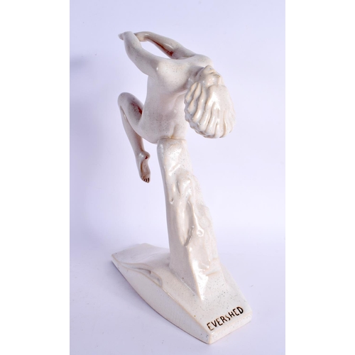 423 - AN ART DECO EVERSHED PAINTED POTTERY ADVERTISING FIGURE. 30 cm x 17 cm.