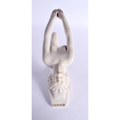423 - AN ART DECO EVERSHED PAINTED POTTERY ADVERTISING FIGURE. 30 cm x 17 cm.