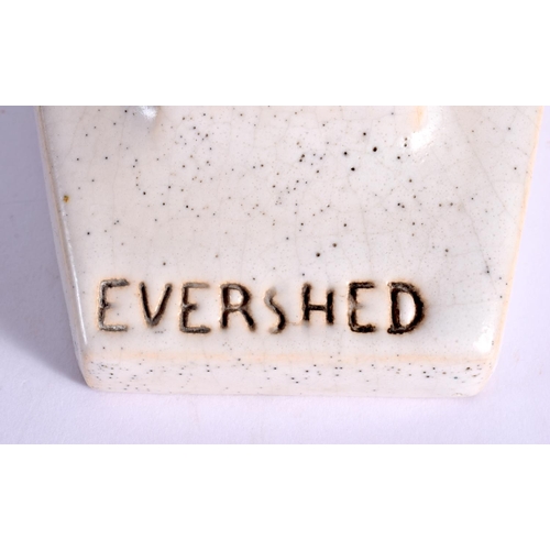 423 - AN ART DECO EVERSHED PAINTED POTTERY ADVERTISING FIGURE. 30 cm x 17 cm.