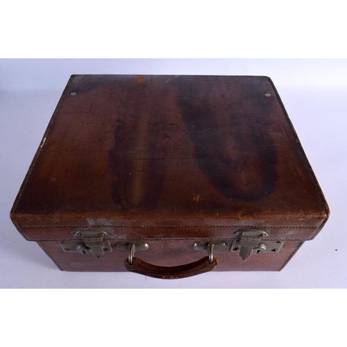 428 - AN ANTIQUE LEATHER CASED TRAVELLING SILVER VANITY CASE with fitted interior. 42 cm x 32 cm x 22 cm.