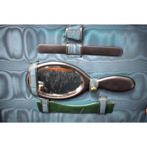 428 - AN ANTIQUE LEATHER CASED TRAVELLING SILVER VANITY CASE with fitted interior. 42 cm x 32 cm x 22 cm.