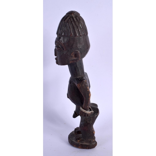 434 - AN AFRICAN TRIBAL YORUBA MALE IBEJI FIGURE. 22 cm x 5 cm. Provenance: Ex Nettleship Collection.