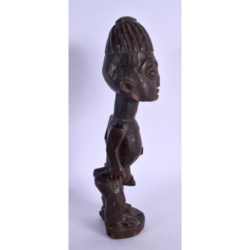 434 - AN AFRICAN TRIBAL YORUBA MALE IBEJI FIGURE. 22 cm x 5 cm. Provenance: Ex Nettleship Collection.