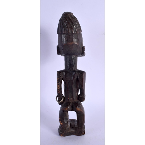 434 - AN AFRICAN TRIBAL YORUBA MALE IBEJI FIGURE. 22 cm x 5 cm. Provenance: Ex Nettleship Collection.
