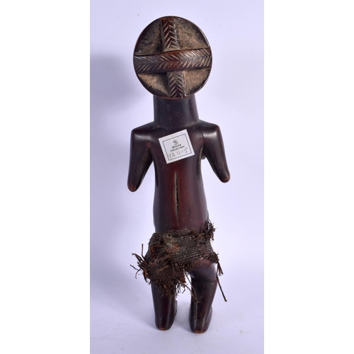 437 - AN AFRICAN TRIBAL LUBA FEMALE FIGURE modelled clutching her breasts. 27 cm high.