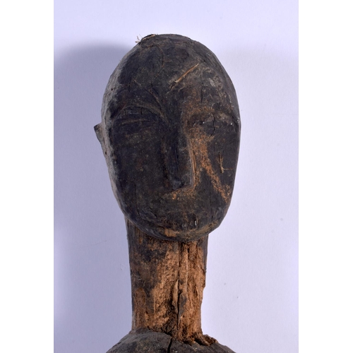 439 - AN EARLY AFRICAN TRIBAL CARVED DOGON FIGURE. 45 cm high.