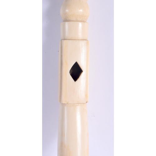 442 - A RARE 19TH CENTURY AFRICAN TRIBAL CARVED IVORY OLIPHANT INSTRUMENT with figural terminal. 54 cm lon... 