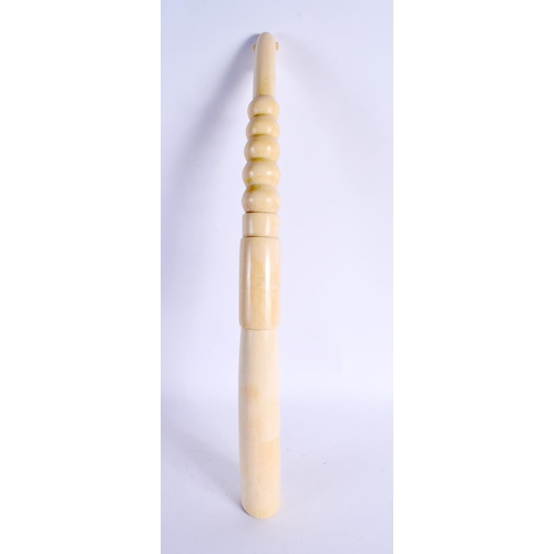 442 - A RARE 19TH CENTURY AFRICAN TRIBAL CARVED IVORY OLIPHANT INSTRUMENT with figural terminal. 54 cm lon... 