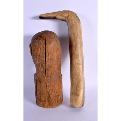 448 - AN UNUSUAL ANTIQUE NORTH AMERICAN TRIBAL INUIT BIRD HEAD TYPE TOOL together a tribal wood bust. Larg... 