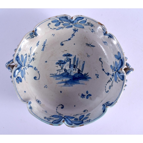 45 - A 19TH CENTURY ITALIAN CANTAGALLI TIN GLAZED POTTERY DISH painted with landscapes. 21 cm wide.