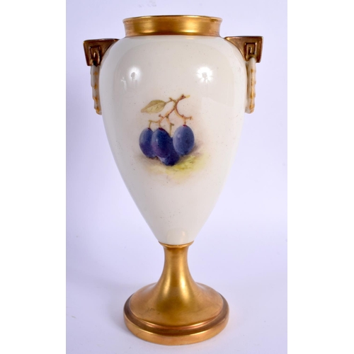 65 - A ROYAL WORCESTER FRUIT PAINTED TWIN HANDLED VASE by Ricketts. 17 cm high.