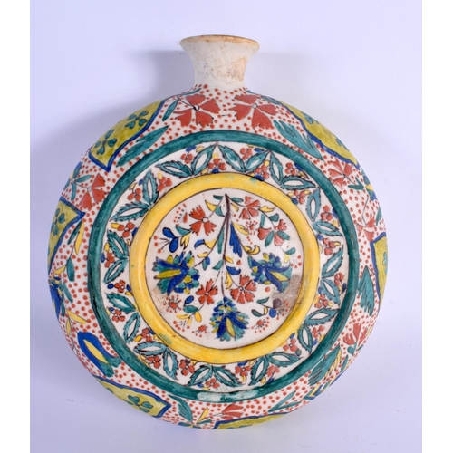 69 - AN OTTOMAN TURKISH KUTAHYA HOLY WATER FLASK painted with flowers. 21 cm x 15 cm.