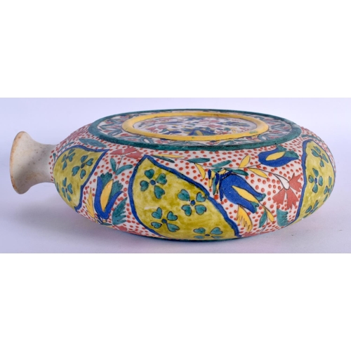 69 - AN OTTOMAN TURKISH KUTAHYA HOLY WATER FLASK painted with flowers. 21 cm x 15 cm.