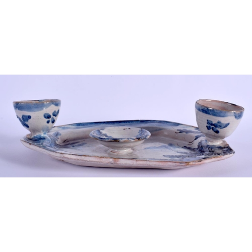7 - AN 18TH CENTURY EUROPEAN FAIENCE TIN GLAZED INKWELL painted with landscapes. 21 cm x 18 cm.