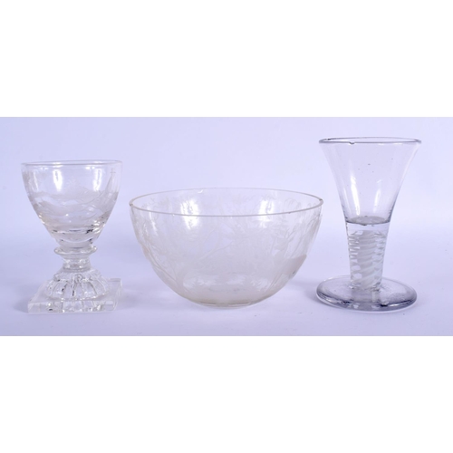 70 - TWO ANTIQUE GLASSES together with an engraved deer bowl. Largest 12.5 cm diameter. (3)