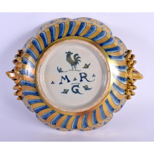 72 - AN ITALIAN TWIN HANDLED CANTAGALLI DISH painted with a bird. 16 cm wide.