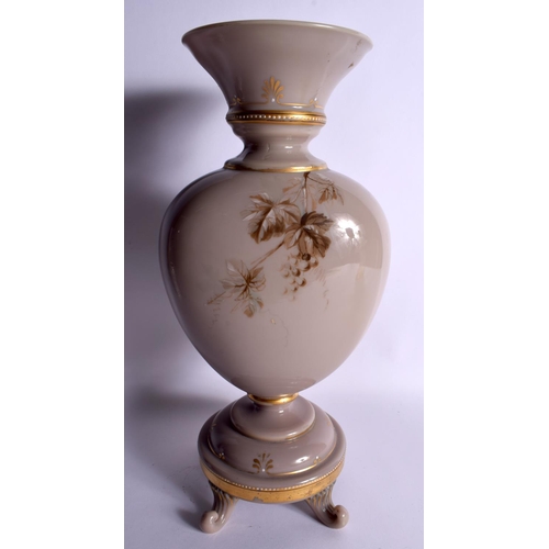 73 - A LARGE LATE VICTORIAN OPALINE GLASS VASE painted with berries and leaves. 36 cm x 15 cm.
