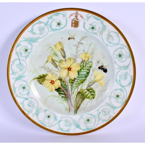 77 - A LATE 19TH CENTURY FRENCH SEVRES PORCELAIN PLATE painted with a coat of arms and flowers. 22 cm dia... 