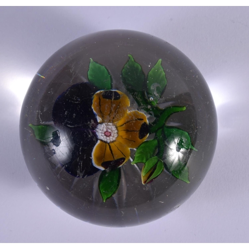 88 - AN ANTIQUE FRENCH SINGLE FLOWER GLASS PAPERWEIGHT. 6 cm wide.