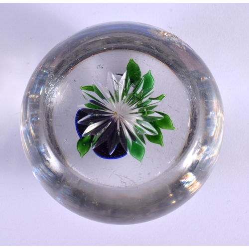 88 - AN ANTIQUE FRENCH SINGLE FLOWER GLASS PAPERWEIGHT. 6 cm wide.