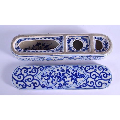 91 - AN OTTOMAN TURKISH MIDDLE EASTERN BLUE AND WHITE PEN BOX AND COVER painted with flowers. 30 cm x 8 c... 