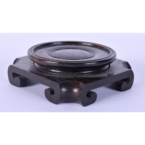 12 - A 19TH CENTURY CHINESE CARVED HARDWOOD SQUARE FORM STAND possibly Zitan. 10.5 cm wide.