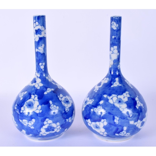 28 - A PAIR OF LATE 19TH CENTURY JAPANESE MEIJI PERIOD BLUE AND WHITE VASES painted with flowers. 16.5 cm... 