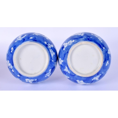 28 - A PAIR OF LATE 19TH CENTURY JAPANESE MEIJI PERIOD BLUE AND WHITE VASES painted with flowers. 16.5 cm... 