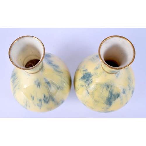 29 - A PAIR OF LATE 19TH CENTURY SEVRES PORCELAIN VASES with gilt banding. 16 cm high.