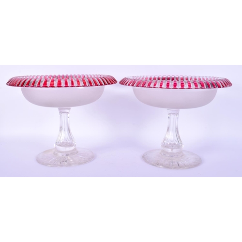 34 - A PAIR OF 1930S BOHEMIAN RUBY FLASH CLEAR GLASS COMPORTS. 18 cm x 16 cm.