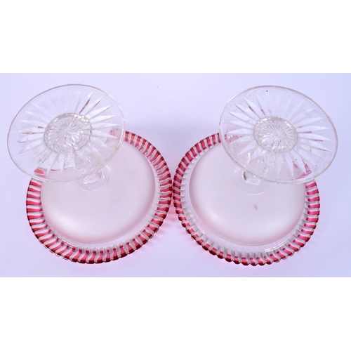34 - A PAIR OF 1930S BOHEMIAN RUBY FLASH CLEAR GLASS COMPORTS. 18 cm x 16 cm.