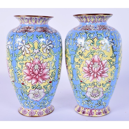 39 - A FINE PAIR OF CHINESE QING DYNASTY CANTON ENAMEL VASES painted with bold foliage and vines. 14 cm h... 
