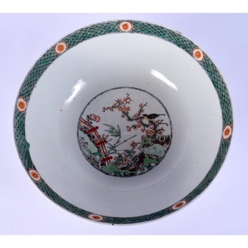 4 - A LARGE EARLY 18TH CENTURY CHINESE FAMILLE VERTE PORCELAIN BOWL Late Kangxi, painted with bold folia... 