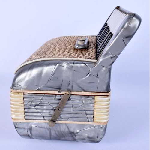 40 - A RARE 1950S ITALIAN ACCORDION CIGARETTE DISPENSER with extending body. 17 cm x 17 cm.