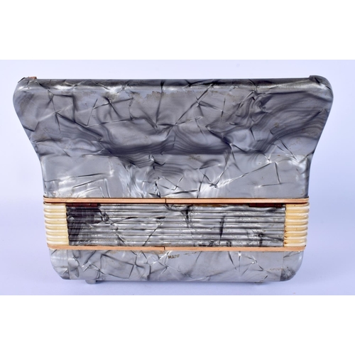 40 - A RARE 1950S ITALIAN ACCORDION CIGARETTE DISPENSER with extending body. 17 cm x 17 cm.