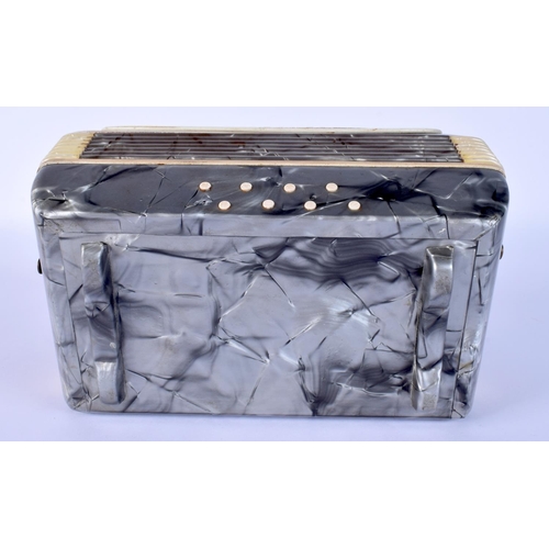 40 - A RARE 1950S ITALIAN ACCORDION CIGARETTE DISPENSER with extending body. 17 cm x 17 cm.