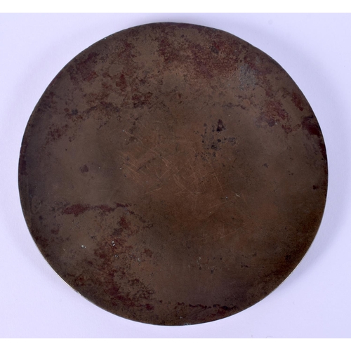 5 - AN EARLY CHINESE BRONZE HAND MIRROR decorated with mythical beasts in various pursuits. 12 cm diamet... 