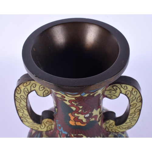 51 - A 19TH CENTURY CHINESE TWIN HANDLED CLOISONNE ENAMEL VASE decorated with birds and foliage. 20 cm hi... 