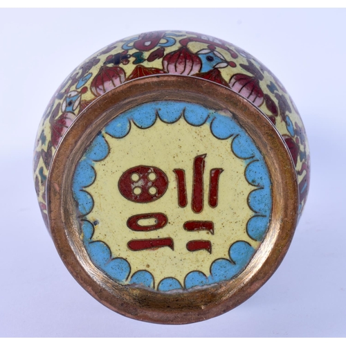 51 - A 19TH CENTURY CHINESE TWIN HANDLED CLOISONNE ENAMEL VASE decorated with birds and foliage. 20 cm hi... 