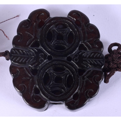 52 - TWO EARLY 20TH CENTURY CHINESE RED LACQUER ITEMS including a jade pendant. Largest 15 cm wide. (3)