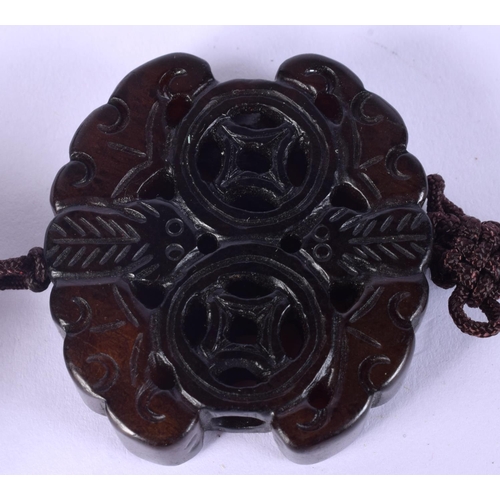 52 - TWO EARLY 20TH CENTURY CHINESE RED LACQUER ITEMS including a jade pendant. Largest 15 cm wide. (3)